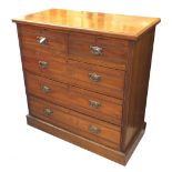 Edwardian walnut chest of drawers, with two short over three graduated long drawers upon a plinth