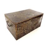 Decorative antique oak leather bound casket, with a hinged top and side carry handles, applied