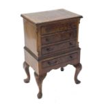 Small figured walnut bedside chest, the moulded top over four drawers on cabriole legs with