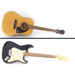 Squier by Fender Strat electric guitar, black finish with various imperfections, electrics in