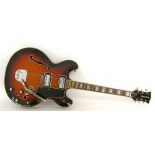Late 1960s Wurlitzer 7742 hollow body electric guitar, made in USA, sunburst finish with lacquer