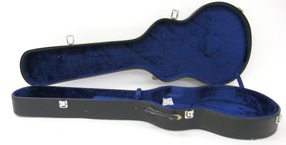 Hard case suitable for a Les Paul style guitar