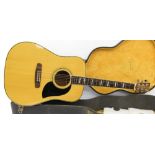 Suzuki acoustic guitar, finish with lacquer blemishes and many surface scratches to the back, bow to