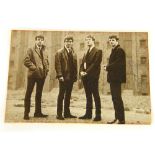 Very rare set of 1963 Beatles autographs on an original postcard depicting all four members on