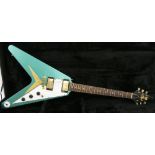 Precision Guitars Flying V replica electric guitar, with crude relic metallic green finish and