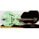 Hutchins Memphis hollow body electric guitar, surf green finish, electrics in working order,