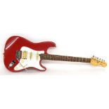 Sunn Mustang electric guitar, red finish in tired condition, headstock logo rubbed back, bridge