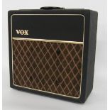 Small vintage guitar amplifier with "Vox" facelift