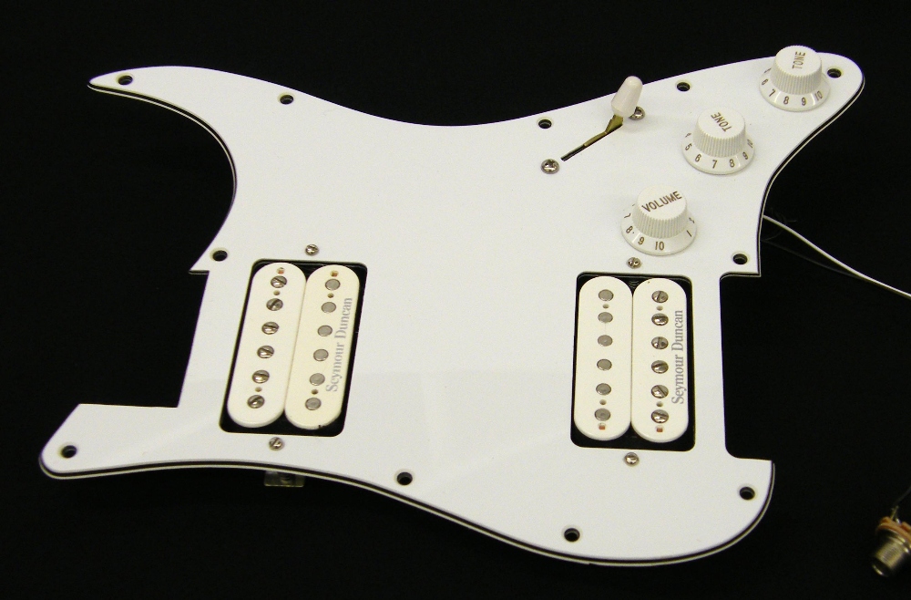 WD Music Products Stratocaster pickguard fitted with a Seymour Duncan JB pickup to the bridge and