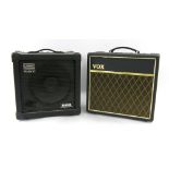 Roland Cube 30 bass amplifier; together with a Vox Pathfinder 15R amplifier (2)