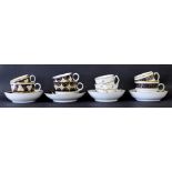 New Hall - four teacups/bowls and coffee cups with saucers in pattern nos. 882, 554, 52 and 695 (