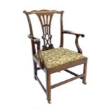 Georgian mahogany carver chair, the vase interlaced splat over the woolwork drop-in seat and