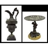 Decorative large 19th century French cast spelter ewer, of baluster form decorated in relief with
