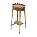 Edwardian mahogany inlaid oval two tier kettle stand in the Sheraton manner, the top with a wavy