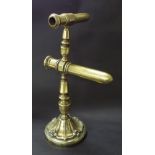 Good 19th century large brass double goffering iron stand upon a circular base, 14.5" high