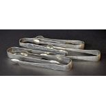 Five pairs of Georgian silver sugar tongs with bright-cut decoration, various hallmarks, 4.9oz