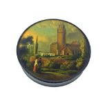 19th century circular papier maché snuff box and cover, painted with a Church landscape with figures
