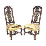Pair of late 17th/early 18th century English walnut dining chairs in the manner of Daniel Marot, the