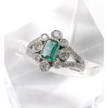 Victorian style 18ct emerald and diamond dress ring, the central emerald in a setting of round