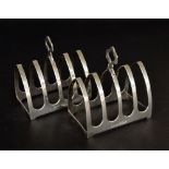 Pair of George V silver lancet design four division toast racks, Sheffield 1933, maker Robinson & Co