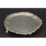 Late Victorian silver waiter, with engraved decoration and beaded cast border upon three ball and