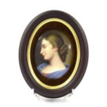 Continental porcelain oval plaque in the Berlin manner, hand painted with a portrait of a lady, 6" x