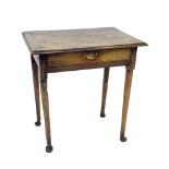 Antique oak side table, the moulded top over a single drawer on circular tapering cabriole legs