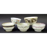 New Hall - four slop bowls in pattern nos. 585, 122, 84 and U82; together with a sugar basin in