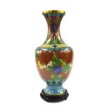 Chinese cloisonne baluster vase, with flower design, 15.5" high, carved wooden stand