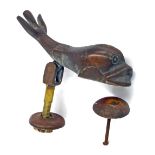 Bronze door knocker in the form of a dolphin with accompanying strike plate, both on 3" bolt for