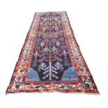 Persian Bakhtiari carpet, 140" x 43" approx