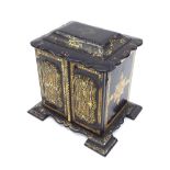 19th century papier maché table-top chest with chinoiserie and gilded decoration, the shaped top