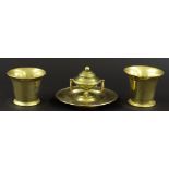 Circular brass inkwell in the form of an urn, together with two antique brass mortars, 3.5" and 4"