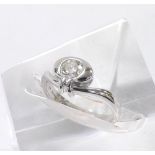 18ct white gold rub-over set solitaire diamond ring, round brilliant-cut, 0.51ct, clarity SI, colour