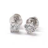 Pair of white gold diamond illusion set stud earrings, round brilliant-cuts, 0.25ct approx, 9ct