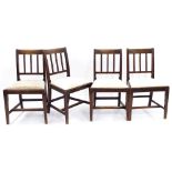 Set of four 19th century dining chairs, with square vertical slat backs over drop-in seats on square