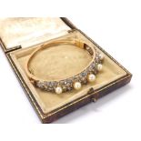 Attractive Victorian style yellow gold diamond and cultured pearl hinged bangle, with five pearls on