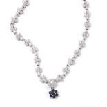 Good 18k white gold diamond necklace with fleur de lys links, set with two hundred and twenty-eight