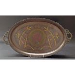 Decorative oval twin-handled brass tray, engraved and polychrome decorated with a central peacock