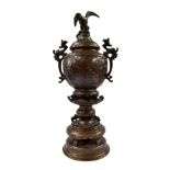 Large decorative Chinese bronze censer surmounted by a bird, 21" high