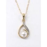 Cultured pearl and diamond pendant on a fine 9ct chain, the pendant 10mm wide