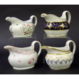 New Hall - four oval shape cream jugs in pattern nos. 692, 940, 990 and 915 (4)