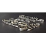 Collection of decorative and plain silver sugar tongs, 6.3oz (8)