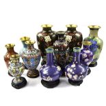 Small collection of eleven Chinese cloisonne vases, with floral and bird decoration, all upon