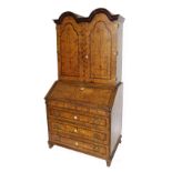 Good early 18th century Continental mulberry and crossbanded double dome bureau bookcase, the