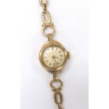 Rodania 9ct lady's bracelet watch, Edinburgh 1959, silvered dial with baton markers and Arabic