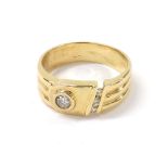 14ct diamond set buckle style ring, with a central round brilliant-cut diamond and three further