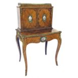 Louis XV style 19th century kingwood and rosewood bonheur du jour, with cast ormolu mounts and inset