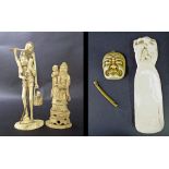 Japanese ivory okimono modelled with a man carrying a figure upon his back holding a basket with a