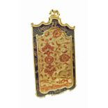 Decorative Georgian style ebonised and gilded wall mirror, the shaped bevelled mirror plate within a